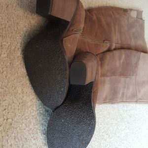 Knee high brown leather boots